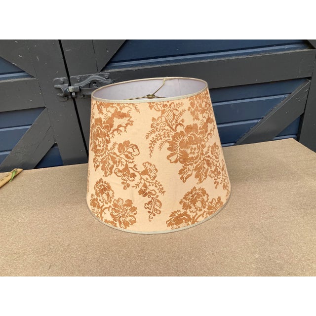 A lampshade handmade from vintage Brunchwig & Fils printed cotton. Measurements: top 11” bottom 16”side 11”