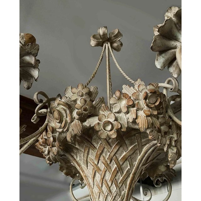Antique, early 20th century hand carved wooden chandelier. Beautifully detailed body is designed with basket weave motif...