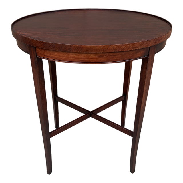 1930s Regency-Style Mahogany Oval Side Table With Cross-Stretcher Base For Sale