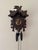 Quality antique Black Forest cuckoo clock, having a quality traditional antique cuckoo clock decorated with carved leaves...