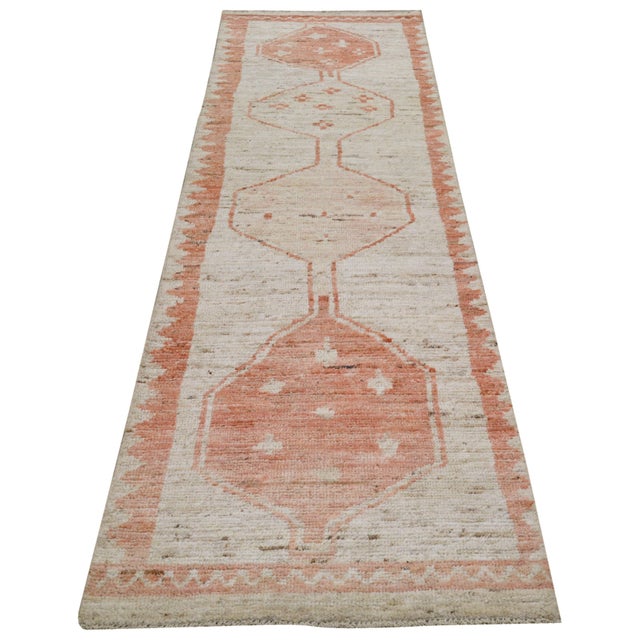 Hand-knotted with care using traditional rug-making techniques, this wool rug blends timeless craftsmanship with a modern...