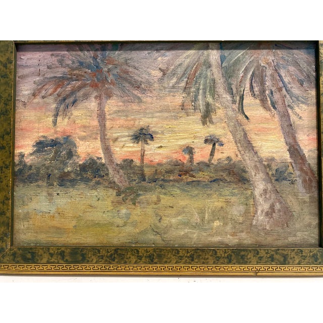 Small old Florida painting from 1935 featuring a sunset scene with palm trees. Oil on board measures 6 1/2” x 9 1/2”. With...