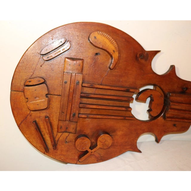 Up for sale is a huge antique hand carved wooden Folk Art guitar wall sculpture sign. It's carved by hand out of very...