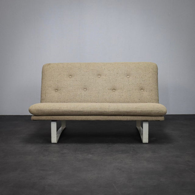 A compact and elegant two-seater sofa designed by kho liang ie for artifort. The c684 model is known for its low profile,...