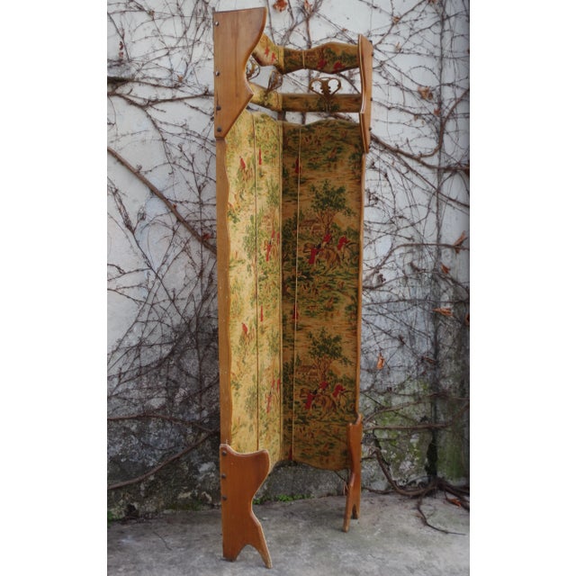Corner coat rack in beech with printing on velvet and brass handles, 50s.