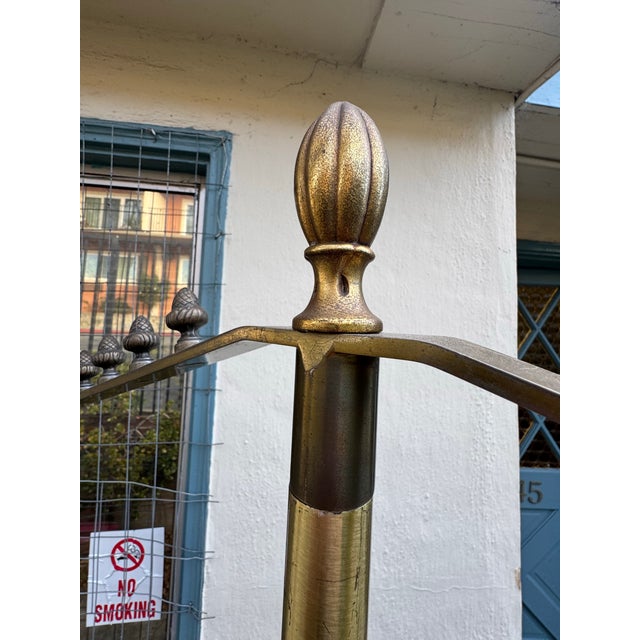 A commanding presence in aged brass, this substantial freestanding valet stand brings the elegance of a classic hotel...