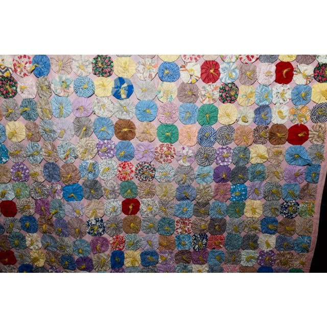 A wonderful survivor from the Great Depression era — a large, fully hand-stitched yo-yo coverlet made in the 1930s from an...