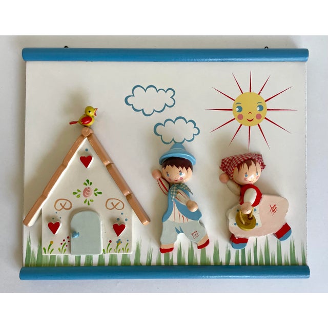 Here is a pair of Kiddie pieces that were made by hand in the 1980's. One is a charming light switch cover that features a...