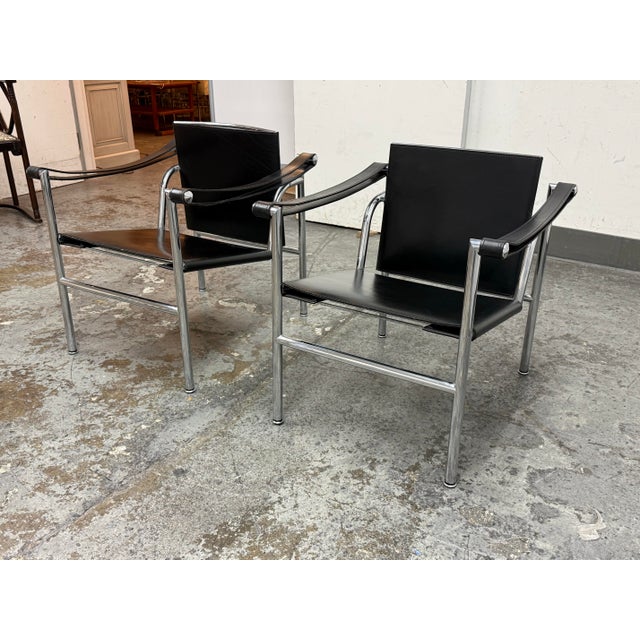 Design Plus Gallery presents a Pair of LC1 Sling Chairs by Le Corbusier for Cassina. Also known as the Camp Chair and...