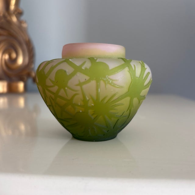 Beautiful petite Emile Galle cameo acid etched vase with an underlying pink hue and green leaf detail.