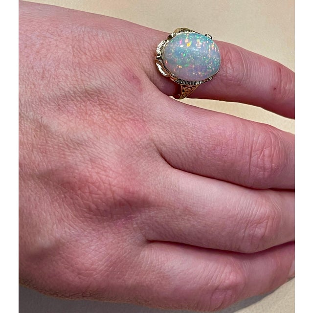 9 Carat Oval Shape Ethiopian Opal Cocktail Ring 14 Karat Yellow Gold For Sale - Image 4 of 18