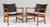 Hans J. Wegner pair of lounge chairs with frame of oiled oak. Upholstered with black leather. Model CH52, made by Carl...