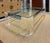 Vintage Lucite and Chrome Coffee Table in Karl Springer Style Offered for sale is a substantial vintage chrome and Lucite...