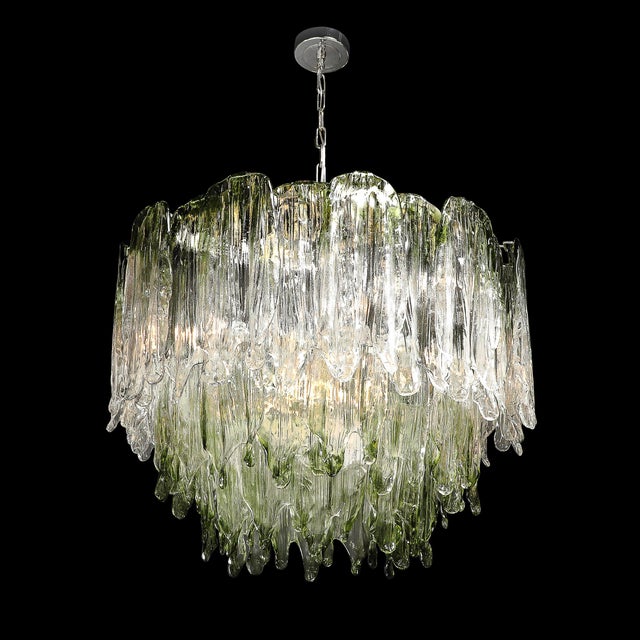 This exquisite Mid-Century Modernist three-tier chandelier, designed and crafted by the renowned glassmakers Mazzega, is...