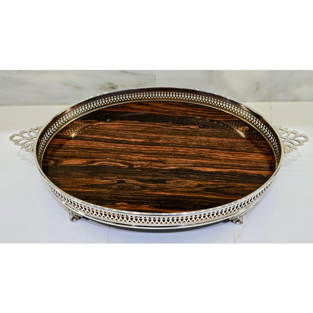 Elevate your bar or vanity with this vintage mid-century modern serving tray by The Sheffield Silver Co., made in the USA...
