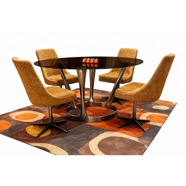 This sculptural dining set by Michel Charron is a strong example of late 20th-century modern design, where architecture,...