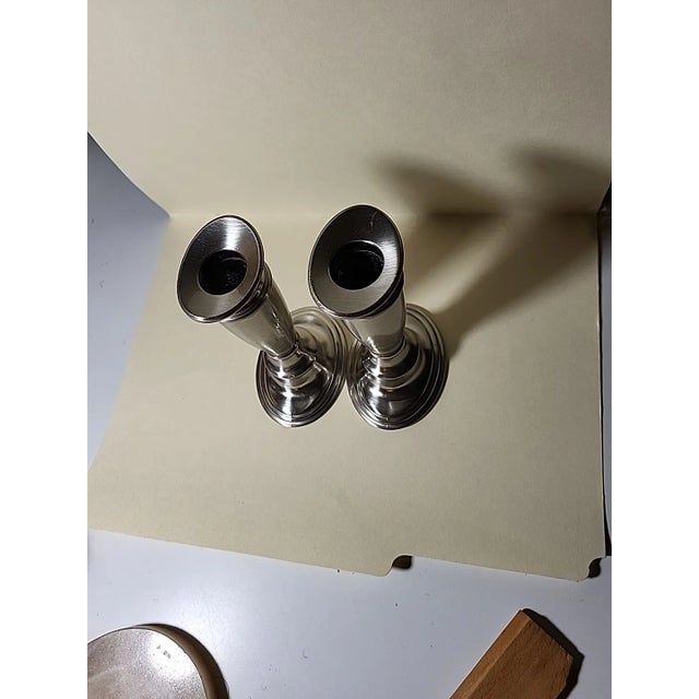 Sophisticated vintage boho candlestick by Valerie Parr Hill , crafted from sleek stainless steel. A minimalist design that...