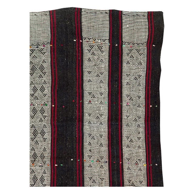 A vintage Turkish flatweave Kilim accent rug handmade during the mid-20th century. Measures: 6' 1" x 7' 7".