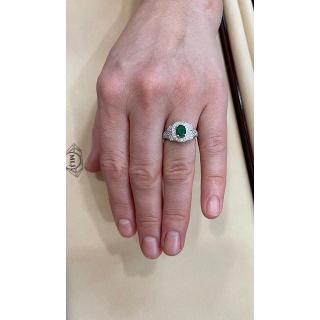 0.80 Carat Oval Cut Emerald and 0.85 Carat Diamond Ring 18 Karat White Gold For Sale - Image 14 of 18
