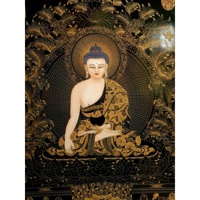 Chinese porcelain gilt Medicine Buddha plaque, Bhaiṣajyaguru, or Pharmacist Tathagata, seated on a lotus throne, he is the...