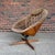 Space Age meets cozy mid-century modernity in this Cone Plycraft swivel chair. The wooden cone shaped base is upholstered...