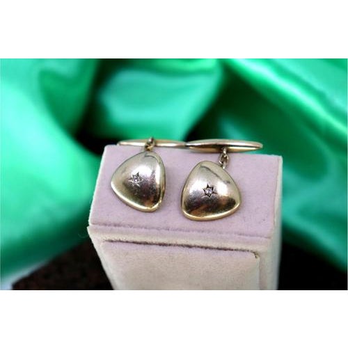 White gold cufflinks in a concave triangular shape with brilliant-cut diamonds. Metal: Gold. Origin: Portuguese. Brand:...