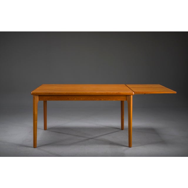 Elegant danish modern dining table designed by henning kjærnulf for vejle møbelfabrik in the 1960s. Crafted from teak with...