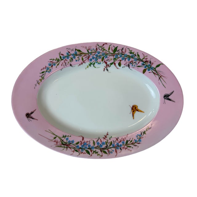 This is a beautiful large antique Limoges porcelain oval platter by Charles Field Haviland, featuring a feminine blush...