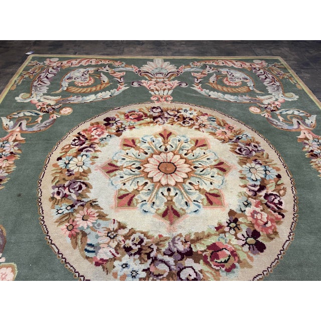 Exceptional early 20th century Spanish rug featuring a refined neoclassical design centered around an elaborate floral...