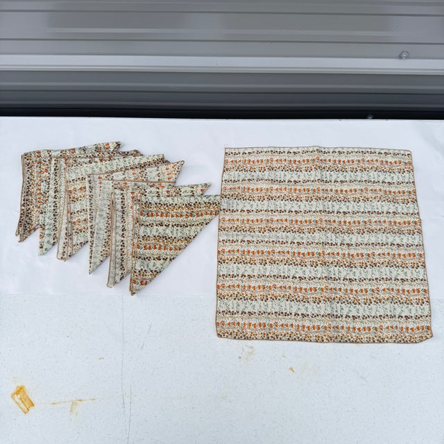 Calico patterned napkins. Set of 7. Earth tone with floral patterns.