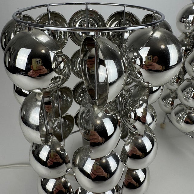 Chrome Bubbles Model 62455 Table Lamps, Set of 2, in Very Good conditions. Designed 1970 to 1979 This piece has an...