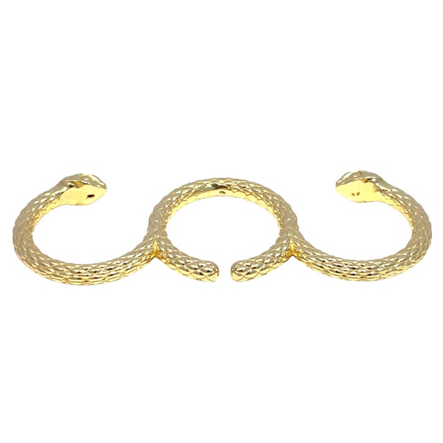 Elevate your jewelry collection with our stunning 18k Yellow Gold Double Head Snake Cuff Ring. This exquisite piece...