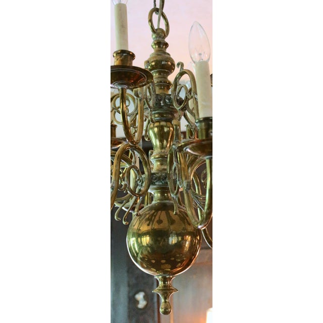 Late 19th-early 20th century Dutch solid brass 2-tier 16-light chandelier. Baroque taste. Made for electricity. From the...
