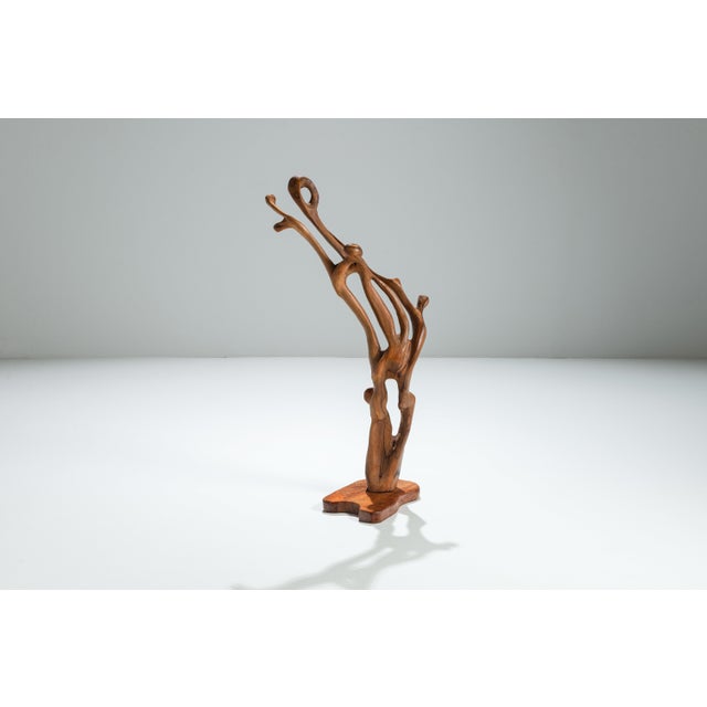 This large vintage handmade sculpture is a striking celebration of organic form and natural material. Carved from richly...