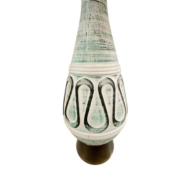 The Rare F.A.I.P Mid Century Geometric Abstract Chalkware Large Teal Table Lamp is a vintage piece with a unique design...