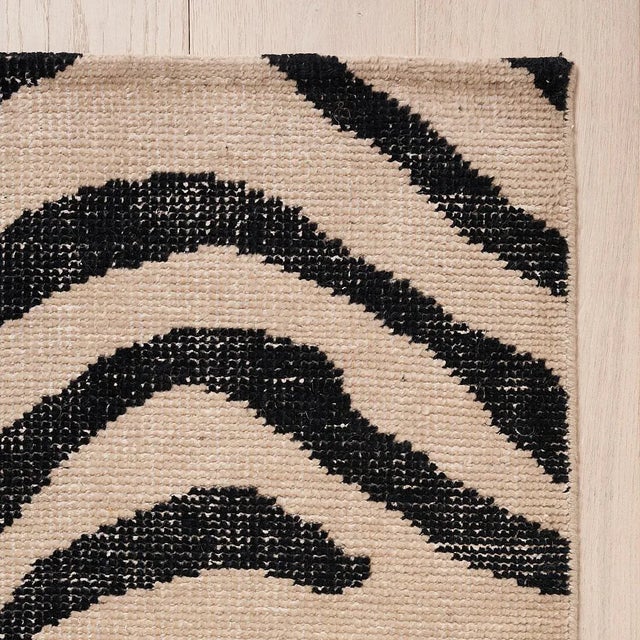 A wildly chic hand-knotted design made of wool and cotton, Zebre features a large-scale abstract animal pattern. Inspired...