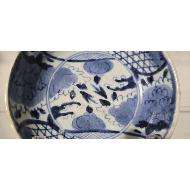 This is a genuine and highly collectible antique Japanese blue and white (Sometsuke) porcelain bowl, handcrafted in the...
