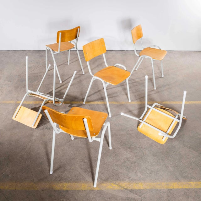1970’s Simple Stacking University Dining Chairs – Set Of Four We sourced these great chairs from a campus in France. Great...