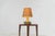 Ceramic table lamp by Søholm for Bornholmsk (Denmark, 1960s). This lamp offers a refined blend of beautiful textures and...