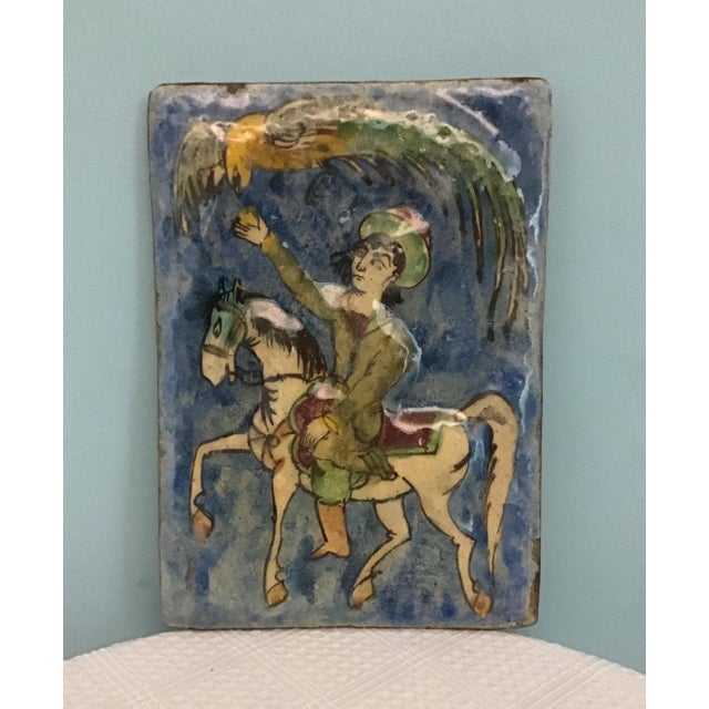 Antique 19th-Century Persian Qajar Dynasty Ceramic Tile – Equestrian with Bird of Prey An authentic 19th-century...