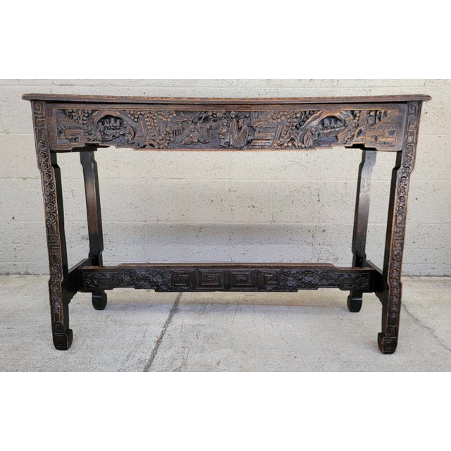 Hand-Carved console or alter table made in Shanghai, China by the "The China Shop". Circa. 1900-1940. The China Shop was...