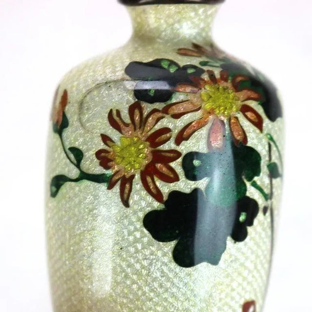 Antique Cloisonne Enameled Cabinet Vase with Flowers, Signed, Early 20thC. Measures - 4.5"H x 2.5"W x 2.5"D A beautifully...