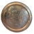 At nearly three feet across, this hand-hammered and hand-engraved brass tray has the scale of architectural wall décor...
