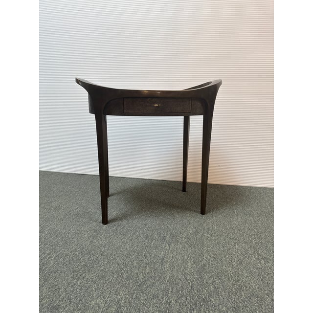 Design Plus Gallery presents a Black Shagreen + Bronze Side Table from Ria and Yiouri Augousti. The table offers a luxury...