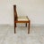 This elegant chair features a refined design typical of scandinavian furniture from the 1960s and 70s. its finely crafted...