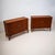 Pair of sideboards, each with two doors and refined brass fittings and handles. The cabinets stand on square legs with...