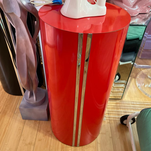 Retro laminate pedestal custom made in 1980s The body is covered with red laminate and there are two long vertical chrome...