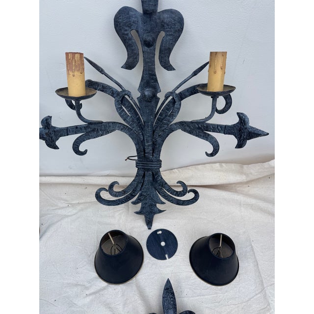 Six French Sconces, solid and weighty black distressed metal with 10 black lamp shades trimmed in gold (missing 2 shades)