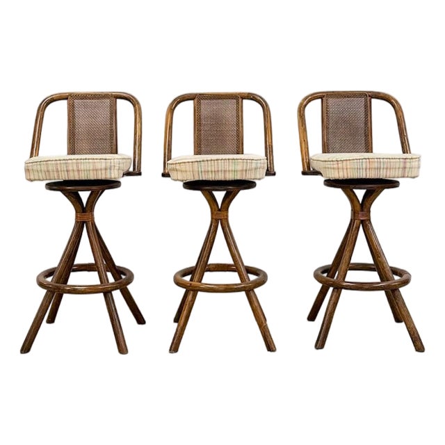3 Vintage Coastal Bamboo Barstools Dark Rattan W/ Beige Cushions and Caned Back For Sale