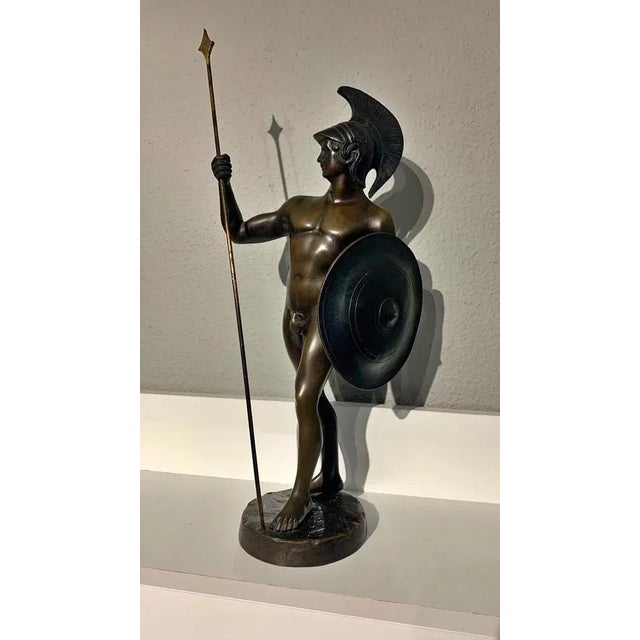 Sculptor of the 19th century, Sculpture: "Greek warrior with spear and shield", bronze, light brown patina with dark...